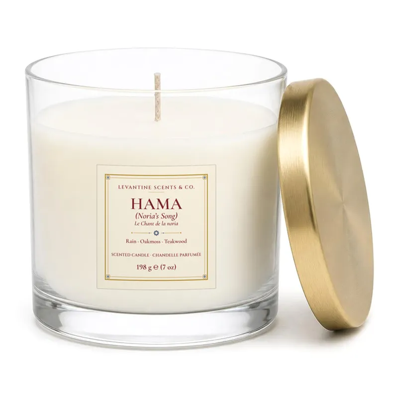 Hama 'Noria's Song' 198 g / 7 oz hand-poured coconut apricot wax candle in a clear jar with gold lid